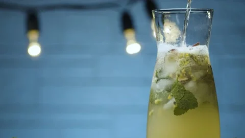 Jug of mint and passion fruit drink Stock Footage 143097523