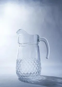 Jug on a white background. Copy space Stock Photos