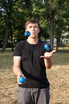 Juggle in a park Stock Photos