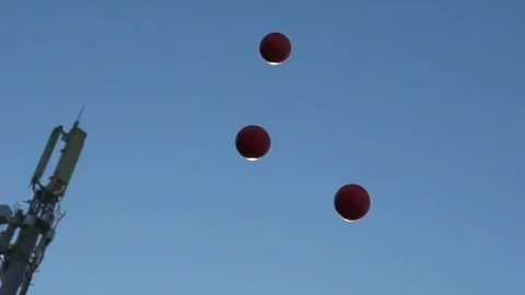 Juggling Balls against blue sky Video stock 101283387