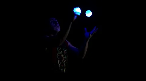 Juggling in the dark.Close up. Slow motion. Stock Footage 60121349