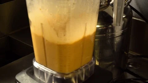 Juice being prepared in the blender Stock Footage 83186214