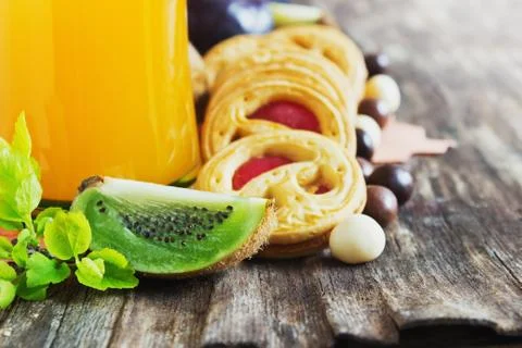 Juice, biscuits and fruit Stock Photos