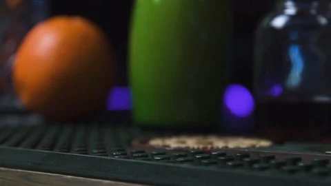 Juice bottle being grabbed and poured into glass Stock Footage 90123301