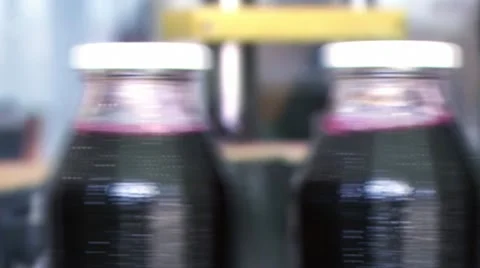 Juice bottles on the production line Stock Footage 8994487