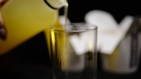Juice, drink is poured in a slow mo in a glass Video stock 127541921
