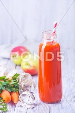 Juice from fruits and vegetables in bottle Stock Photos