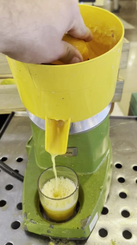 Juice machine hand Stock Footage 306089127