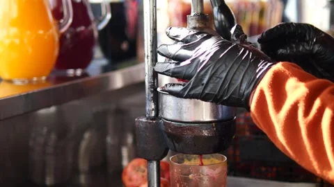 Juice making process in a busy kitchen during daytime Stock Footage 337243267