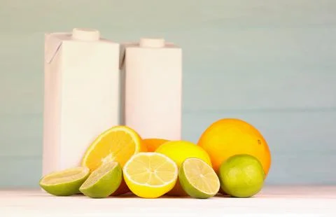 Juice pack with citrus extracts. Selective focus. Fresh juice package with lemon Stock Photos