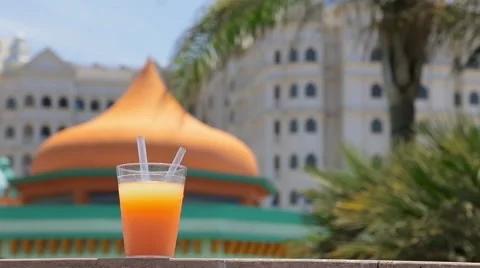 Juice, palm tree and hotel Stock Footage 49444700