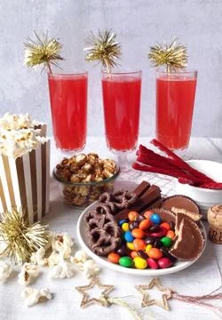 Juice with popcorn in summer time Stock Photos