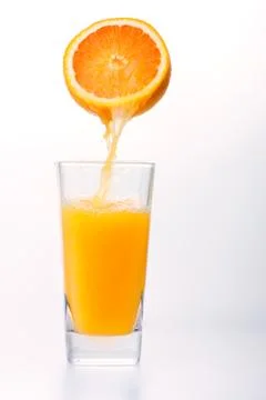 Juice to pour from orange Stock Photos