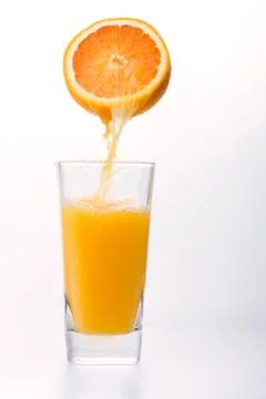 Juice to pour from orange Stock Photos