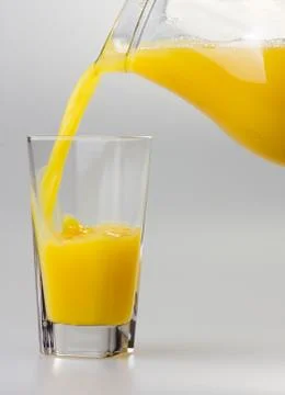 Juice to pour from pitcher Stock Photos