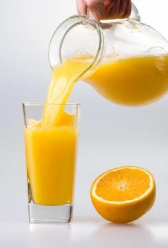 Juice to pour from pitcher Stock Photos
