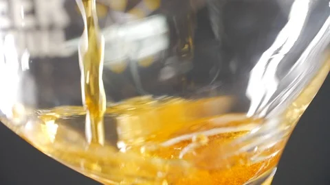 Juice is poured into a glass Stock Footage 89687878