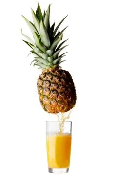 Juice pouring from pineapple Stock Photos