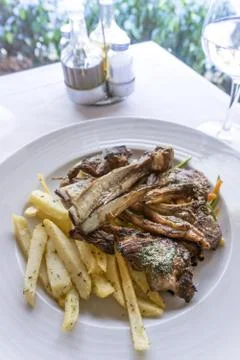 Juice roasted lamb chops on the table Stock Photos