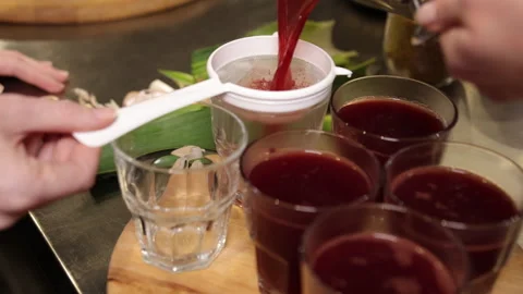 Juice straining, kitchen task, juice preparation 스톡 동영상 287621286