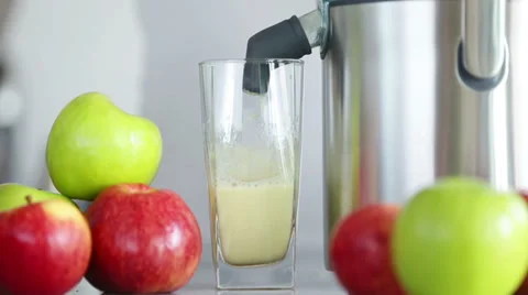 Juicer making apple juice Stock Footage 35224968