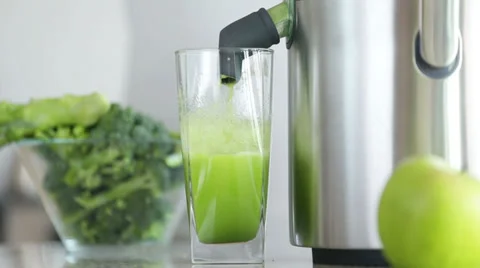 Juicer making green broccoli vegetable juice Stock Footage 35224753