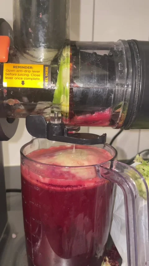 Juicing, beets, beetroot, apple, red cabbage and ginger  스톡 동영상 329403266