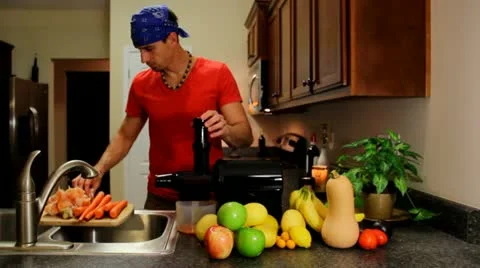 Juicing Carrots Stock Footage 17465175