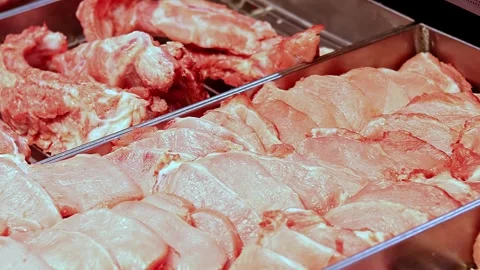 Juicy and quality raw meat on counter for sale in butchers shop. Stock Footage 296429240
