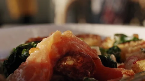 Juicy and tasty slice of egg benedict with salmon pick from a white plate 스톡 동영상 151297295