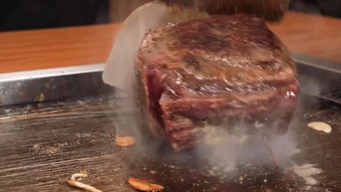 Juicy Beef Roast Searing on Hot Professional Griddle with Steam and Spices Stock Footage 333600191