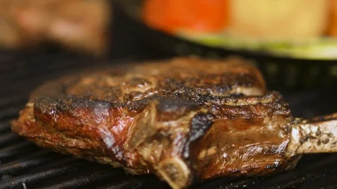 Juicy Bone in Steak on the Grill Stock Footage 91449026