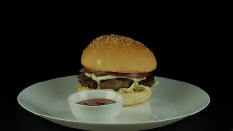 Juicy Burger with tomato sauce Stock-Footage 80490545