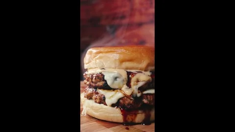 Juicy Cheese Burger with BBQ Sauce Stock Footage 326001953