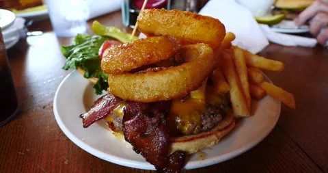Juicy Cheeseburger on a Diner Plate Stock Footage 240810581