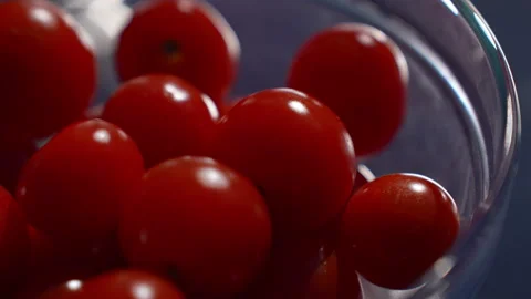 Juicy cherry tomatoes in a culinary cup Vidéo 238725651