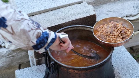 Juicy chickpea dish is placed on the plate Stock Footage 294064145