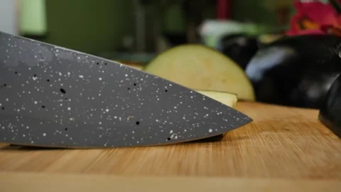 Juicy Eggplant Slices on Rustic Cutting Board Stock Footage 311894503