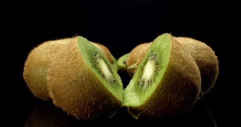 Juicy fresh kiwi fruit cut in half super macro high quality close up shoot Video stock 129974841
