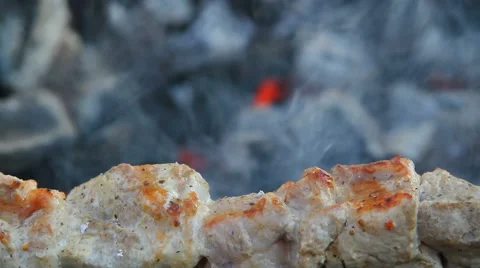 Juicy fried meat on the grill Stock Footage 60063489