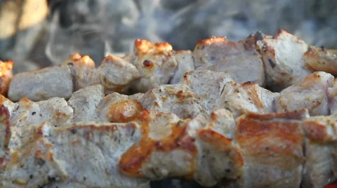 Juicy fried meat on the grill Video stock 60064476