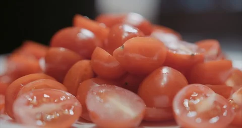 Juicy grape and cherry tomatoes sliced Stock-Footage 105303096