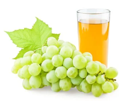 Juicy grape with leaf and full glass of juice Stock Photos