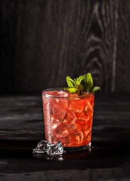 Juicy grapefruit drink on dark table Stock Photos
