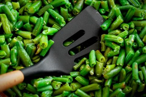 Juicy green string beans close-up. Background. Diet food or healthy vegetable Stock Photos