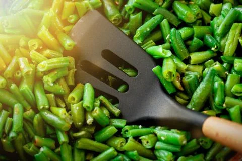 Juicy green string beans close-up. Background. Diet food or healthy vegetable Stockfoto's