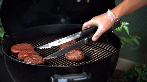 Juicy grilled red round beef cutlets roasting on barbecue grill Stock-Footage 108114503