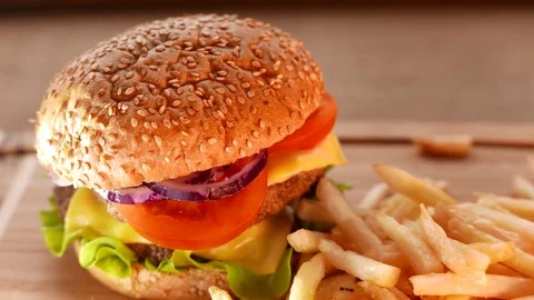 Juicy hamburger with fried potatoes 動画素材 74170975