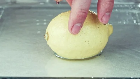 Juicy lemon. Lemon in water splashes. Stock Footage 80239679