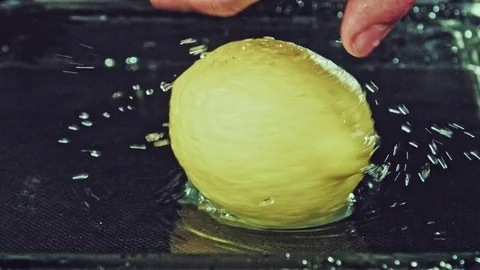 Juicy lemon. Lemon in water splashes. Stock Footage 80240199